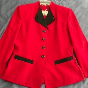 Skirt suit from Kasper.  Lined.  50% polyester 60% Acetate.